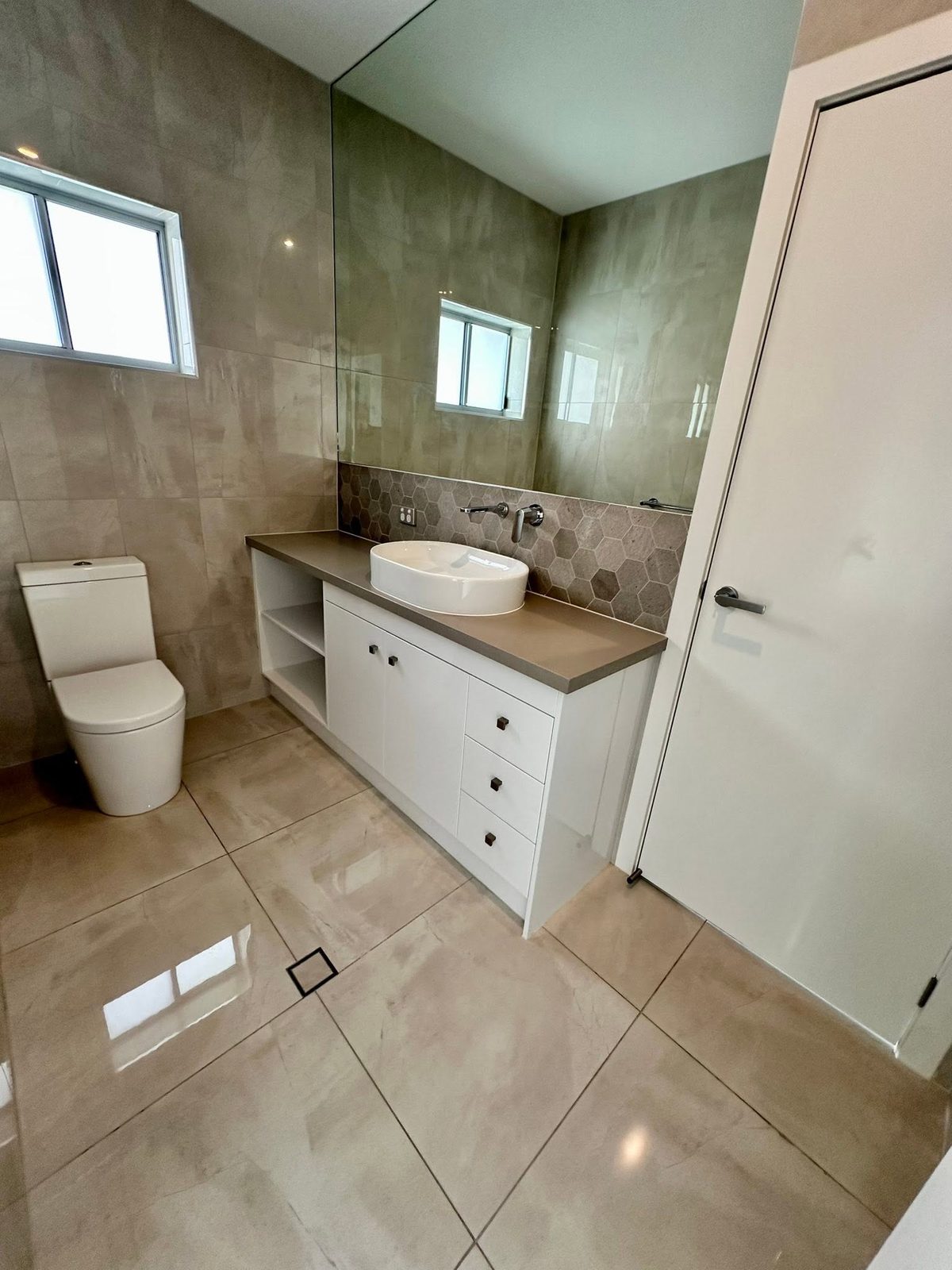 Modern ensuite bathroom cleaned to a shine