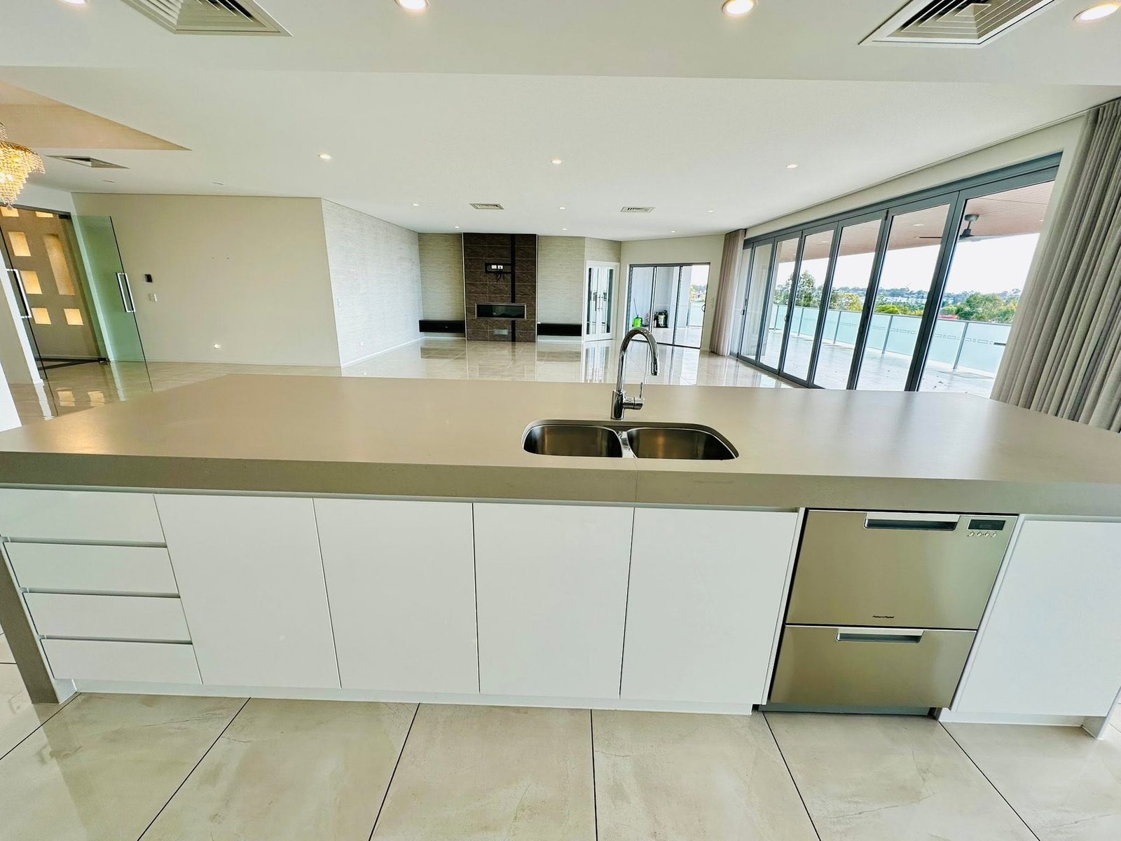 Spotless modern kitchen cleaned by BCP in a Brisbane waterfront home