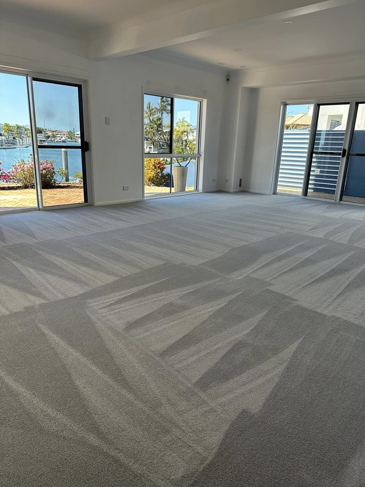 Freshly cleaned carpet in a waterfront living room
